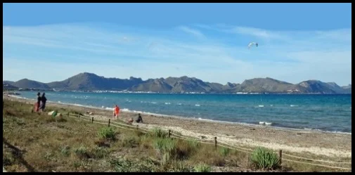 beach of Pollentia Club Mallorca kiteschool kitespot in summer July and August
