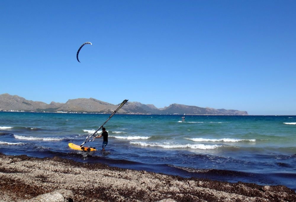 8 la playa eel Portblue y nuestra escuela de kite foils